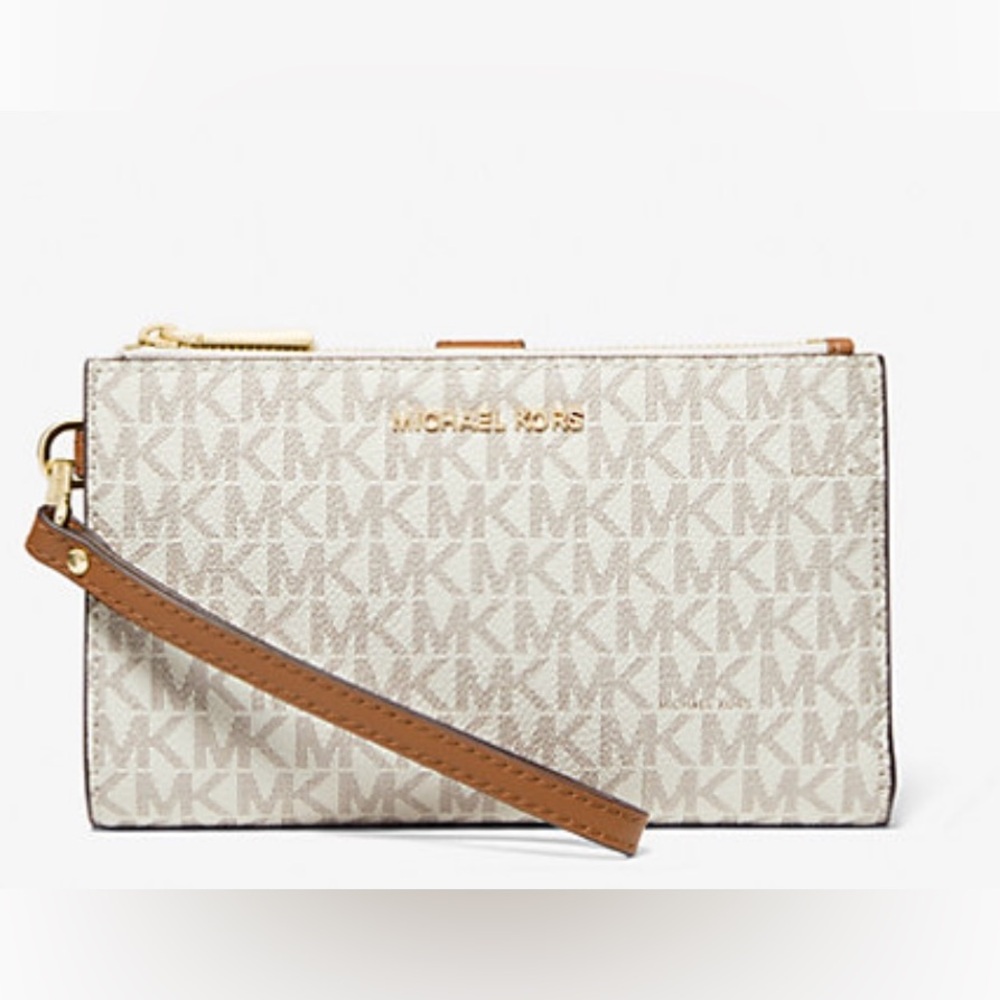 Michael Kors Jet Set travel Large wristlet. New without tags.